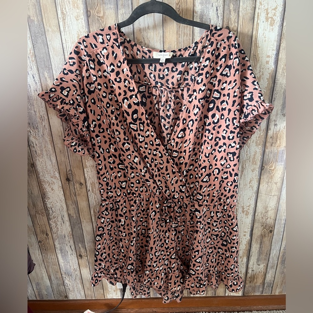 Cheetah print romper with ruffle sleeves and synched waist